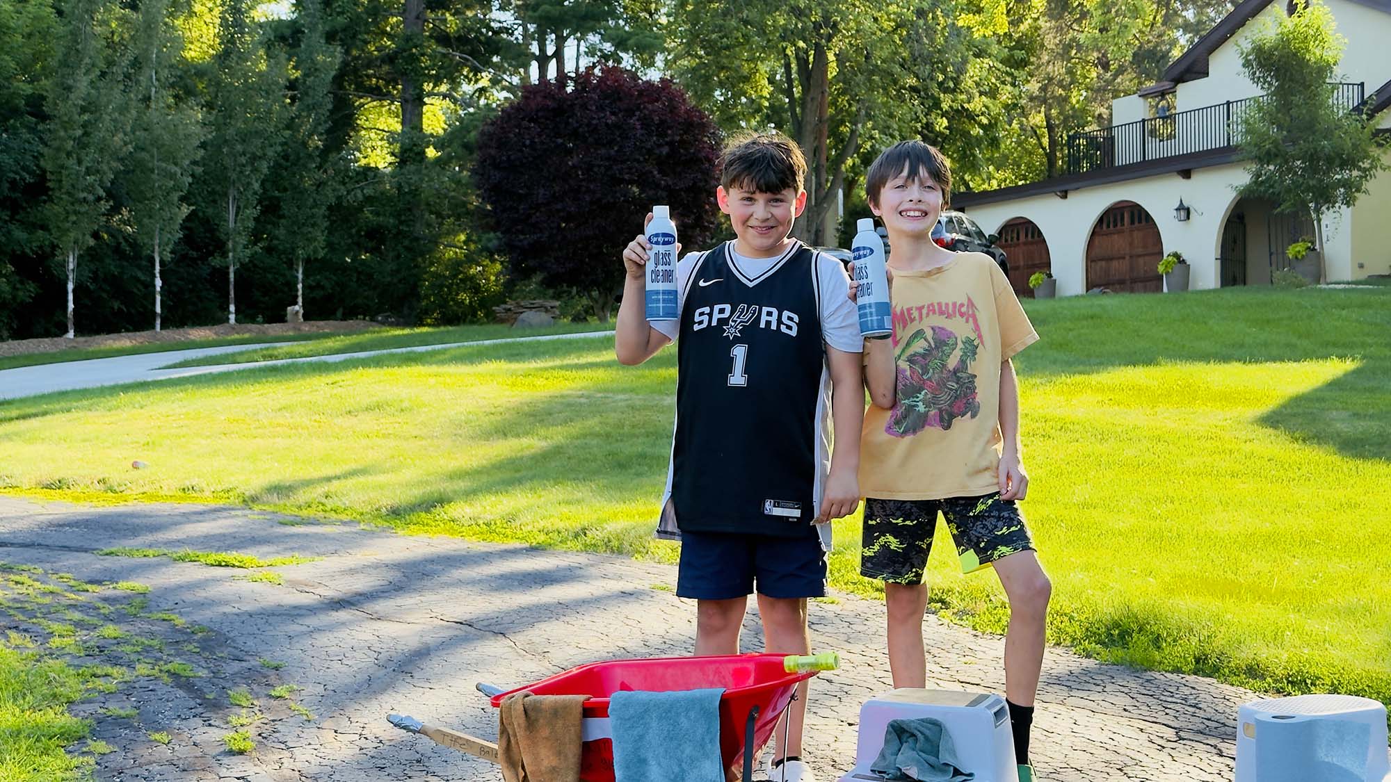 Preston and Grayson, the Glass Brothers, out on the job with their squeegees